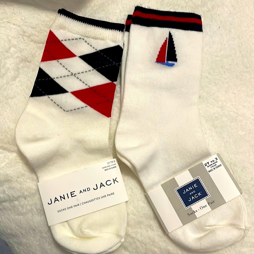 Two Janie and Jack dress socks.